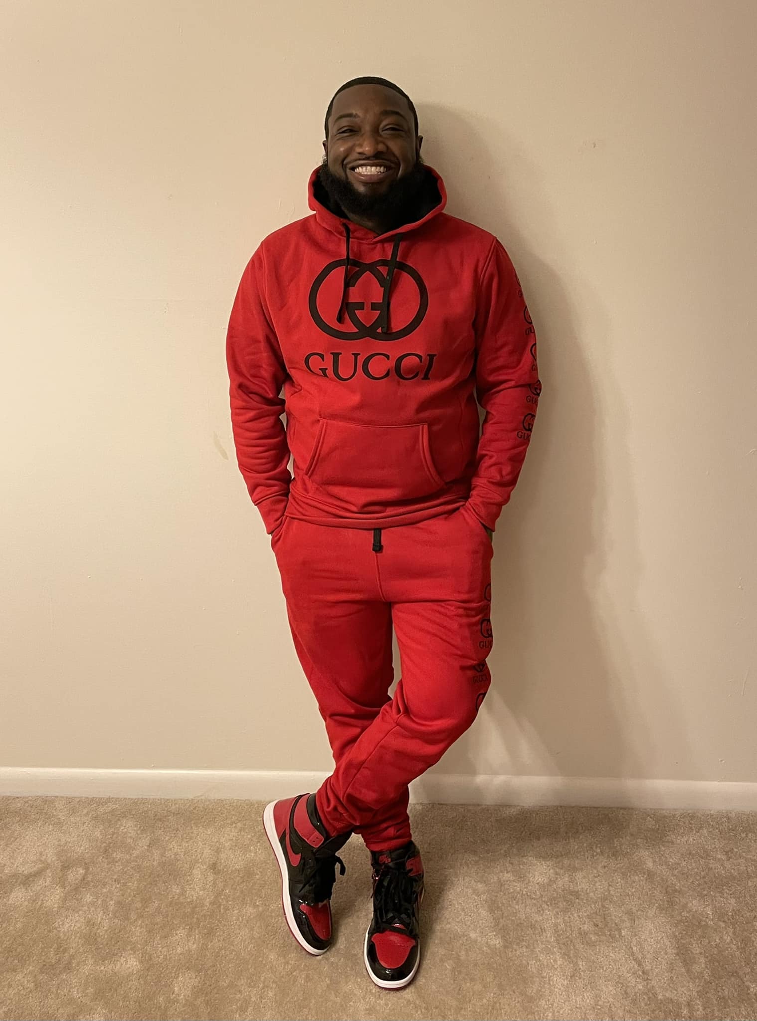 David Weaver in a red tracksuit